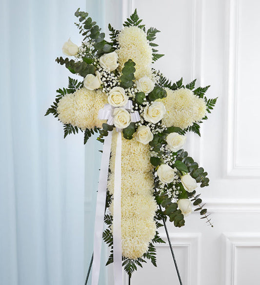 Peace and Prayers Standing Cross in White, funeral flower cross with white roses, chrysanthemums, baby's breath, and greenery