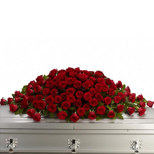 Greatest Love Casket Spray, full casket spray with red roses and mixed greenery