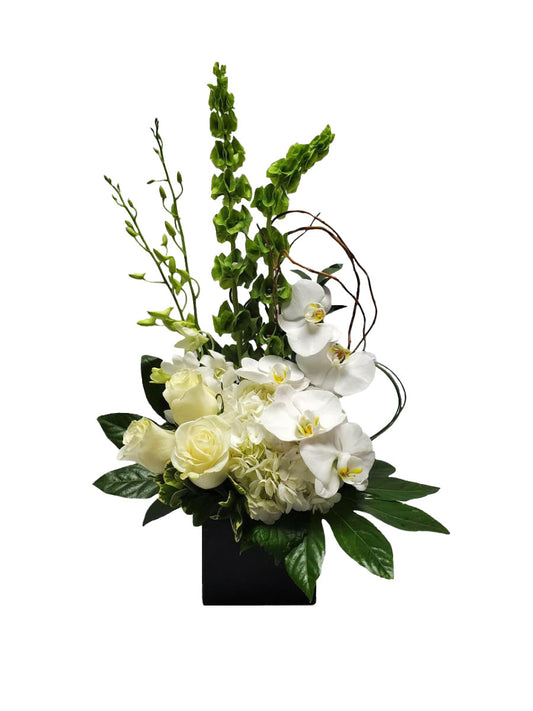 Product photo of Pure Elegance bouquet with white orchids flowers and greenery