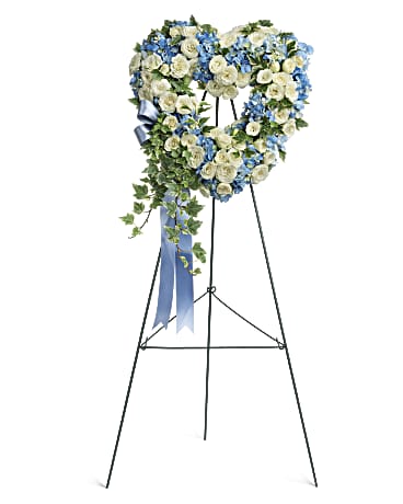 Pure Heart Standing Spray, heart-shaped funeral spray arrangement with white roses and blue hydrangeas