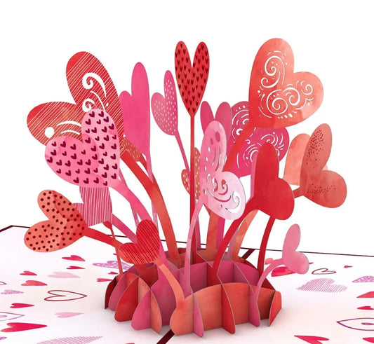 Colorful pop-up card featuring vibrant hearts in various sizes and patterns, perfect for expressing love and appreciation.